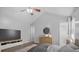 Staged main bedroom featuring vaulted ceiling, hardwood floors, and neutral decor at 600 Dolphin Dr, Summerville, SC 29485