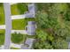 An aerial view of the neighborhood showcasing roof tops and mature trees at 633 Alwyn Blvd, Summerville, SC 29485