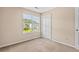Bedroom with neutral paint, carpet and a window letting in ample natural light at 633 Alwyn Blvd, Summerville, SC 29485