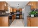 Efficient kitchen with updated stainless steel appliances, tile backsplash, and ample storage at 633 Alwyn Blvd, Summerville, SC 29485
