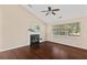 Bright living room featuring vaulted ceiling, fireplace, and large window at 633 Alwyn Blvd, Summerville, SC 29485