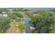 Aerial view showing a lovely home site next to a canal, dock, and marsh views at 689 Port Cir, Charleston, SC 29412