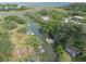 Aerial view showcasing waterfront property and the surrounding scenic landscape, perfect for nature enthusiasts at 689 Port Cir, Charleston, SC 29412