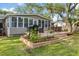 Beautiful backyard featuring an outdoor deck with grill, dining, seating and greenery at 689 Port Cir, Charleston, SC 29412