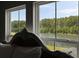 Bedroom view of fenced waterfront from two windows at 7011 Pumpkinseed Dr, Johns Island, SC 29455