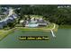 An aerial view of a community pool next to a lake at 7035 Pumpkinseed Dr, Johns Island, SC 29455