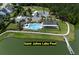 An aerial view of the community pool, parking lot, and clubhouse at 7035 Pumpkinseed Dr, Johns Island, SC 29455