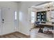 Bright foyer with wood floors leading to a charming office space at 7035 Pumpkinseed Dr, Johns Island, SC 29455