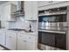 The kitchen is equipped with stainless steel appliances, sleek cabinetry, and a gas cooktop at 7035 Pumpkinseed Dr, Johns Island, SC 29455