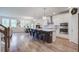Bright and spacious open-concept kitchen with a large island, stainless steel appliances, and sleek white cabinetry at 7035 Pumpkinseed Dr, Johns Island, SC 29455