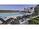 Resort style pool with lounge chairs, pool house, and a beautiful lake view is the perfect getaway at 7035 Pumpkinseed Dr, Johns Island, SC 29455