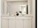 Bathroom vanity with double sinks, white cabinets, modern fixtures, and a large mirror for added convenience at 786 Ridgley Dr, Summerville, SC 29486