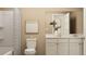 Well lit neutral tone bathroom with shower and tub combination at 786 Ridgley Dr, Summerville, SC 29486