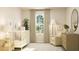 Charming Bedroom with a white crib, soft lighting, cozy armchair, and delightful decor creating a peaceful ambiance at 786 Ridgley Dr, Summerville, SC 29486