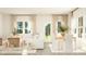 Open-concept living area with natural light, modern decor, a comfortable sofa, and stylish dining set at 786 Ridgley Dr, Summerville, SC 29486