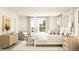 Bright, airy main bedroom with a four poster bed, soft neutral tones, and warm natural light at 786 Ridgley Dr, Summerville, SC 29486