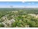 Aerial view of a home near the James Island Rec Complex, surrounded by lush greenery at 800 Heyward Cove Pl, Charleston, SC 29412
