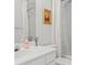 Bathroom with white vanity, framed artwork, and a shower tub combo at 800 Heyward Cove Pl, Charleston, SC 29412