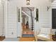 Inviting open front door, revealing staircase and glimpse of the home's interior at 800 Heyward Cove Pl, Charleston, SC 29412