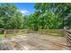 Spacious back deck perfect for outdoor entertaining with natural wood finish at 8112 Halifax Way, North Charleston, SC 29420