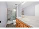 Bathroom features a marble shower with glass door, wood cabinet, and brushed nickel faucet at 8112 Halifax Way, North Charleston, SC 29420