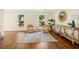 Inviting living room with hardwood floors, neutral decor, and plenty of natural light at 8112 Halifax Way, North Charleston, SC 29420