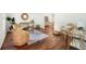 Inviting living room featuring hardwood floors, stylish decor, and open floor plan at 8112 Halifax Way, North Charleston, SC 29420