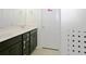 Bathroom featuring double vanity with black cabinets and white countertops, plus modern tile at 8127 Saveur Ln, Charleston, SC 29406