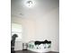A view of the bedroom with a window, a desk with a chair and a twin bed at 8127 Saveur Ln, Charleston, SC 29406