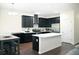 Kitchen with island and stainless steel appliances at 8127 Saveur Ln, Charleston, SC 29406
