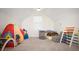 The playroom features a play tent, climbing gym, and comfortable sleeping space at 8127 Saveur Ln, Charleston, SC 29406