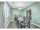 Charming dining room featuring a modern table set, stylish decor, and hardwood floors, perfect for Gathering meals and gatherings at 9101 Parlor Dr, Ladson, SC 29456
