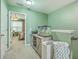 Inviting hallway featuring a storage cabinet and adjacent bedroom at 9101 Parlor Dr, Ladson, SC 29456