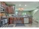 Modern kitchen with stainless steel appliances, granite countertops, and ample cabinet space for storage at 9101 Parlor Dr, Ladson, SC 29456