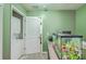 Functional laundry room with washer/dryer, an aquarium, and ample storage space at 9101 Parlor Dr, Ladson, SC 29456
