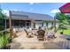 Outdoor deck featuring a fire pit and ample seating for entertaining at 9133 Markleys Grove Blvd, Summerville, SC 29485