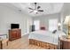 This is a bedroom featuring a ceiling fan and warm wood floors at 9133 Markleys Grove Blvd, Summerville, SC 29485