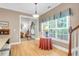 Open dining space with a large window providing natural light and a view to the connected room at 9133 Markleys Grove Blvd, Summerville, SC 29485