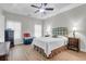 Serene main bedroom with a comfortable bed, decorative headboard, and stylish furnishings at 9133 Markleys Grove Blvd, Summerville, SC 29485