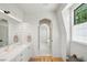 Stylish bathroom with shiplap walls, and a view to another bathroom at 922 Kincade Dr, Mount Pleasant, SC 29464