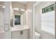 Bathroom featuring white vanity, neutral walls and window. Bathroom opens to a shower at 922 Kincade Dr, Mount Pleasant, SC 29464