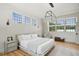 Well-lit bedroom with hardwood floors, modern lighting and large windows at 922 Kincade Dr, Mount Pleasant, SC 29464