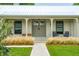 Inviting home exterior featuring a covered front porch and manicured landscaping at 922 Kincade Dr, Mount Pleasant, SC 29464