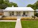 Charming single-story home with modern design, well-maintained lawn, and inviting entrance at 922 Kincade Dr, Mount Pleasant, SC 29464