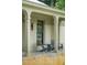 Cozy front porch with metal roof, featuring comfortable seating and stylish design at 922 Kincade Dr, Mount Pleasant, SC 29464