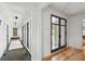 Hallway with hardwood floors and natural light leading to the outside patio at 922 Kincade Dr, Mount Pleasant, SC 29464