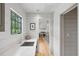 Kitchen featuring an undermount sink, marble countertops, and hardwood floors at 922 Kincade Dr, Mount Pleasant, SC 29464