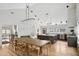 Bright, open kitchen/dining area with stainless appliances, a large butcher block island, and hardwood floors at 922 Kincade Dr, Mount Pleasant, SC 29464