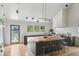 Spacious kitchen with wood floors, gray cabinetry, large wood island, and modern stainless appliances at 922 Kincade Dr, Mount Pleasant, SC 29464