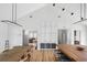 Open concept living space with large dining table and view of kitchen with butcher block island at 922 Kincade Dr, Mount Pleasant, SC 29464